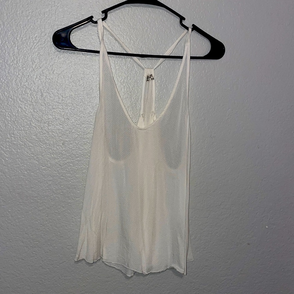 Free People razor back tank top. White. Deep v neck. Sheer & sexy. Brand new